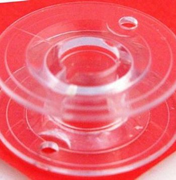 BOBBIN White 1977 2037 plastic sold as each